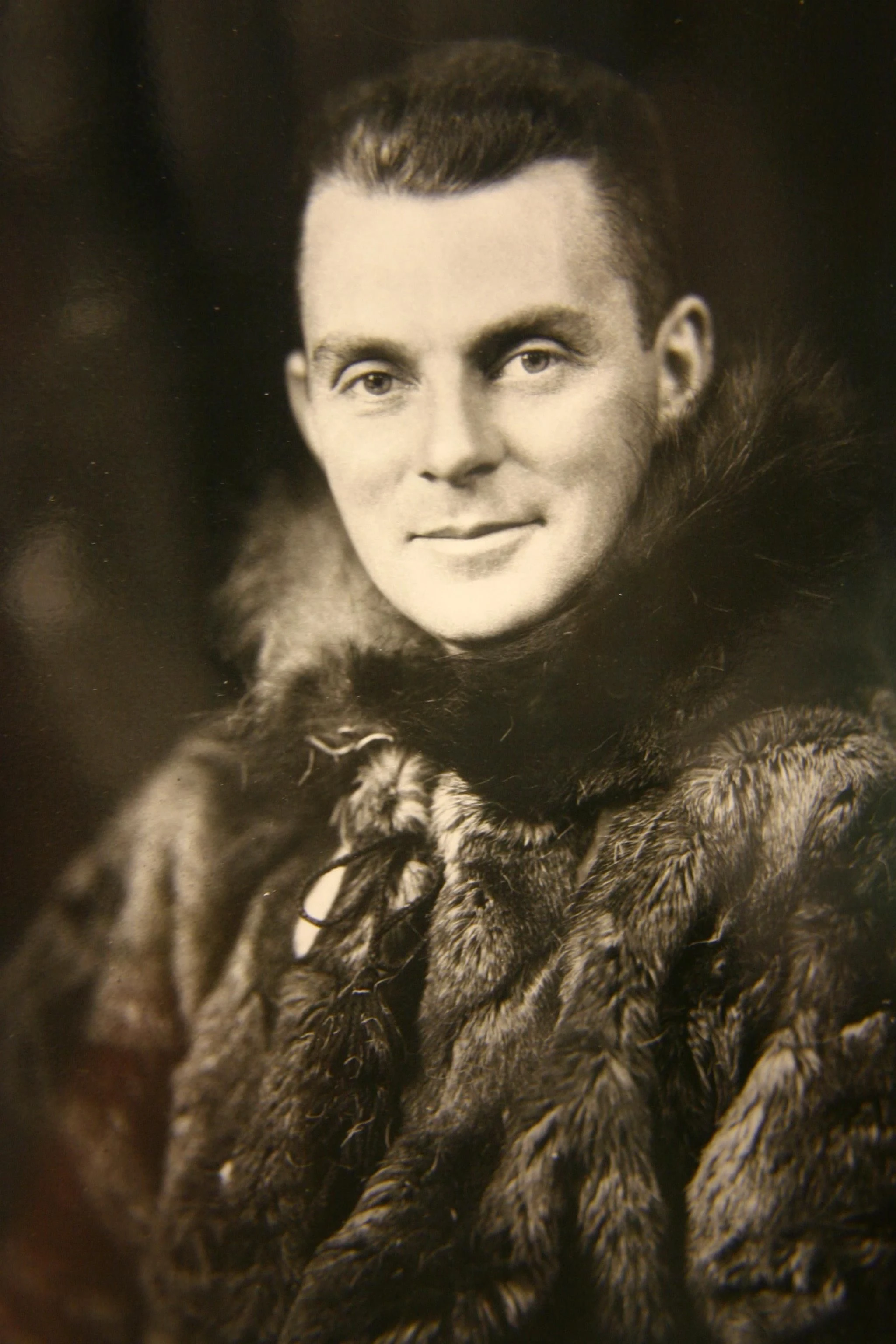 C. H. “Punch” Dickins in a fur coat, looking toward the camera.